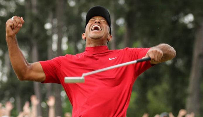  Tiger Woods celebrates after sinking his putt on the 18th that won a fifth Masters at Augusta National. Photograph: Lucy Nicholson/Reuters