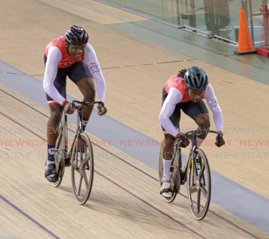 TT's Zion Pulida, right, competes against Dannell James at the Easter Grand Prix at the National Cycling Velodrome, Couva, April 20. - Photo by Grevic Alvarado (Image obtained at newsday.co.tt)